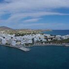 Aerial drone photo of iconic main town and port of Tinos island featuring monastery of Panagia Megalochari | Von aerial-drone